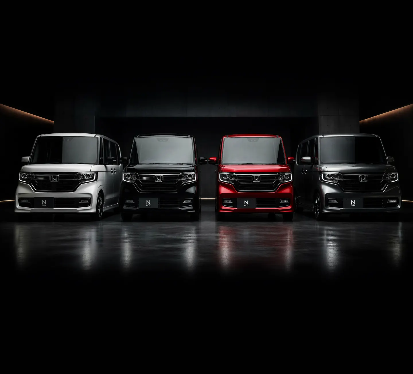 Four Honda N-Box cars lined up in white, black, red and silver