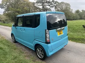 2015 Honda N-Box, blue, rear three-quarter view, other side