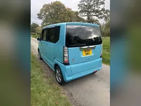 2015 Honda N-Box, blue, rear three-quarter view